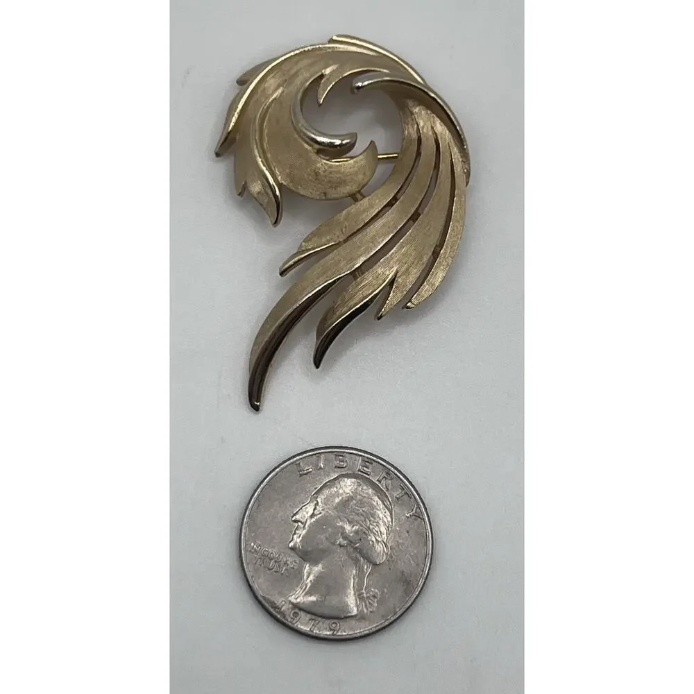 Vintage Crown Trifari Classic Textured Gold Tone Open Swirl Costume Brooch